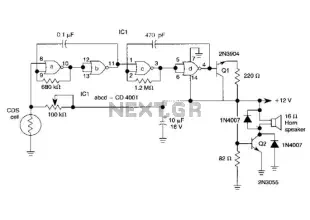 High-Output Pulsed-Tone/Light-Activated Alarm Circuit